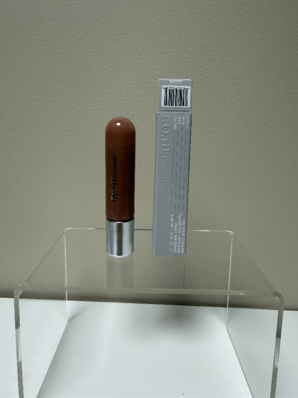 r.e.m. beauty by Ariana Grande On your collar lip plumping gloss Away Message